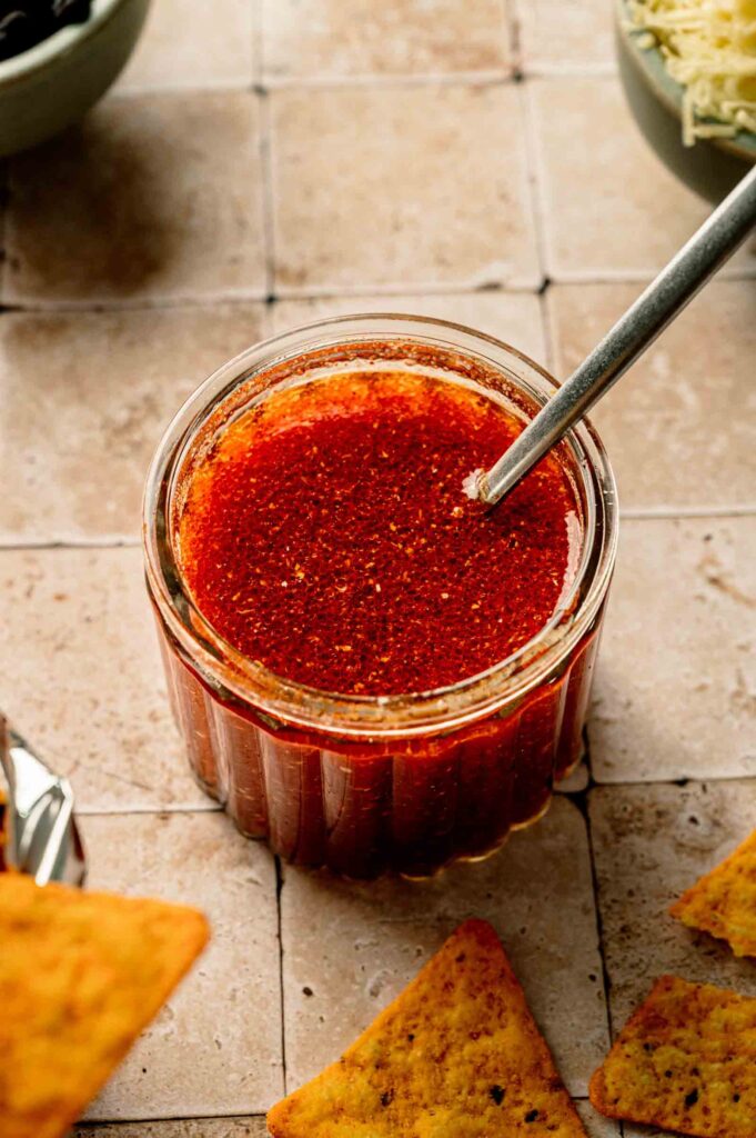 Catalina dressing in a jar with Nacho Cheese Doritos on the side.